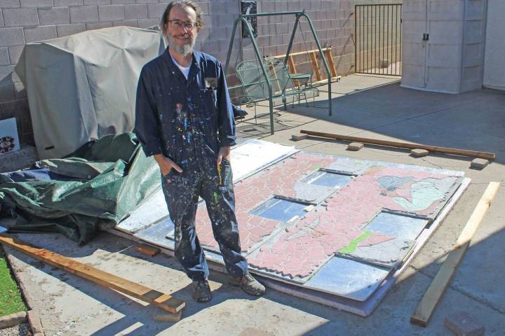Ron Eland/Boulder City Review Boulder City artist Lee Lanier stands in his backyard next to one ...