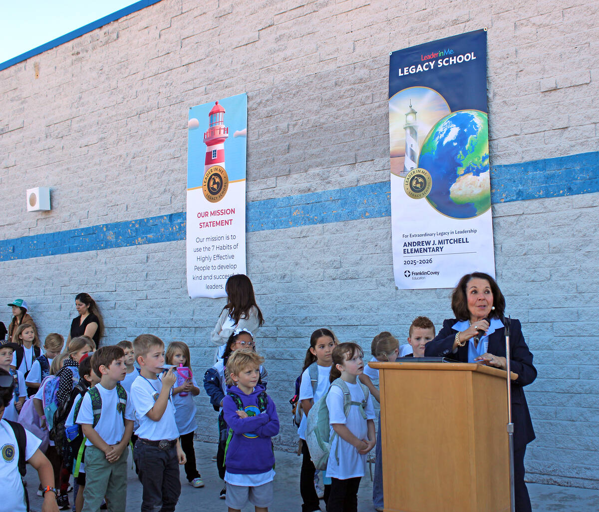 Ron Eland/Boulder City Review Flanked by students from Mitchell Elementary was Friday’s ...